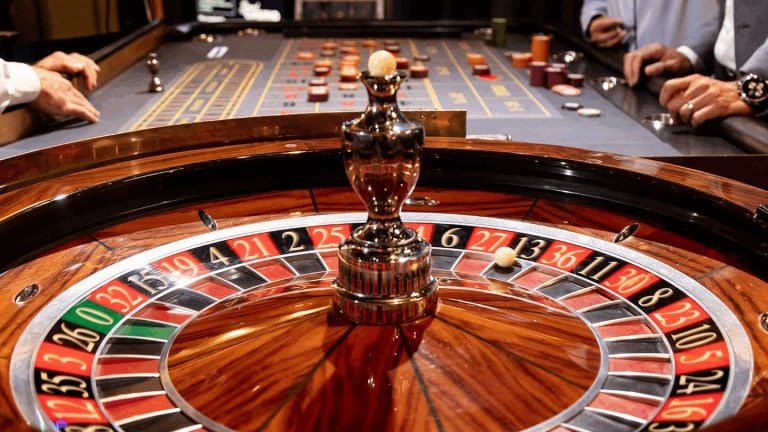 Mobile phone showing baccarat card table and score board